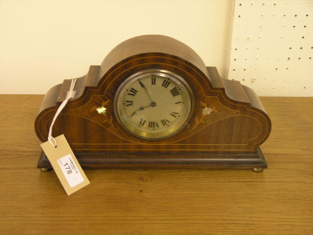 Appraisal: An Edwardian inlaid mahogany mantel clock with silvered dial and