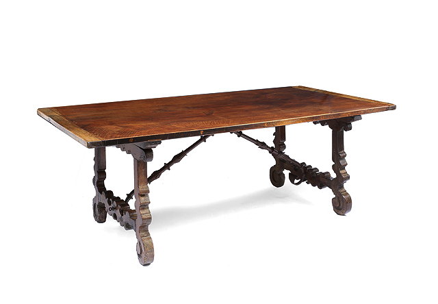 Appraisal: AN ANTIQUE WALNUT RECTANGULAR TOPPED SPANISH DINING TABLE shaped supports