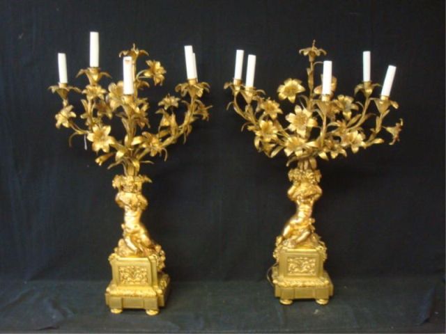 Appraisal: Pair of Bronze Figural and Floral Candlebra Great quality From