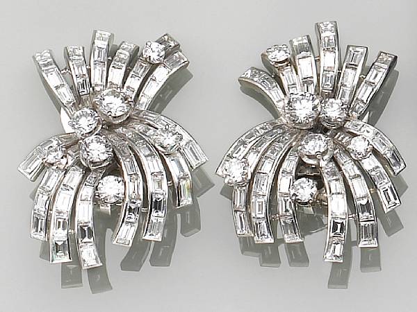 Appraisal: each earclip designed as a spray of baguette-cut diamonds with