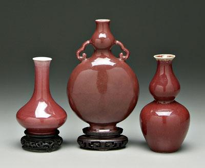 Appraisal: Three pieces Chinese sang-de-boeuf all porcelain bottle vase with graduated