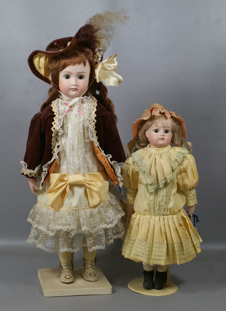 Appraisal: Reproduction Closed Mouth German dolls both are meant to represent