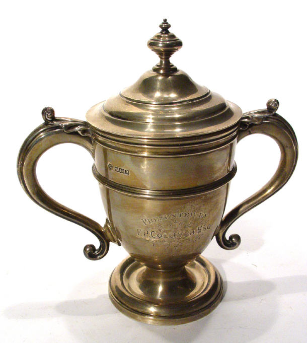 Appraisal: Twin handled silver trophy and cover Sheffield cm high