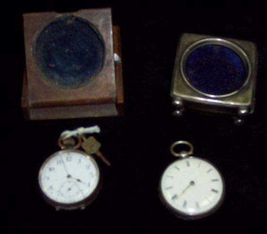 Appraisal: A watch stand in the form of a travelling clock