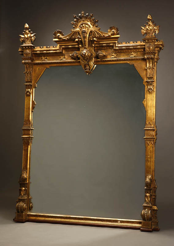 Appraisal: A large Aesthetic Movement giltwood mirror A large Aesthetic Movement