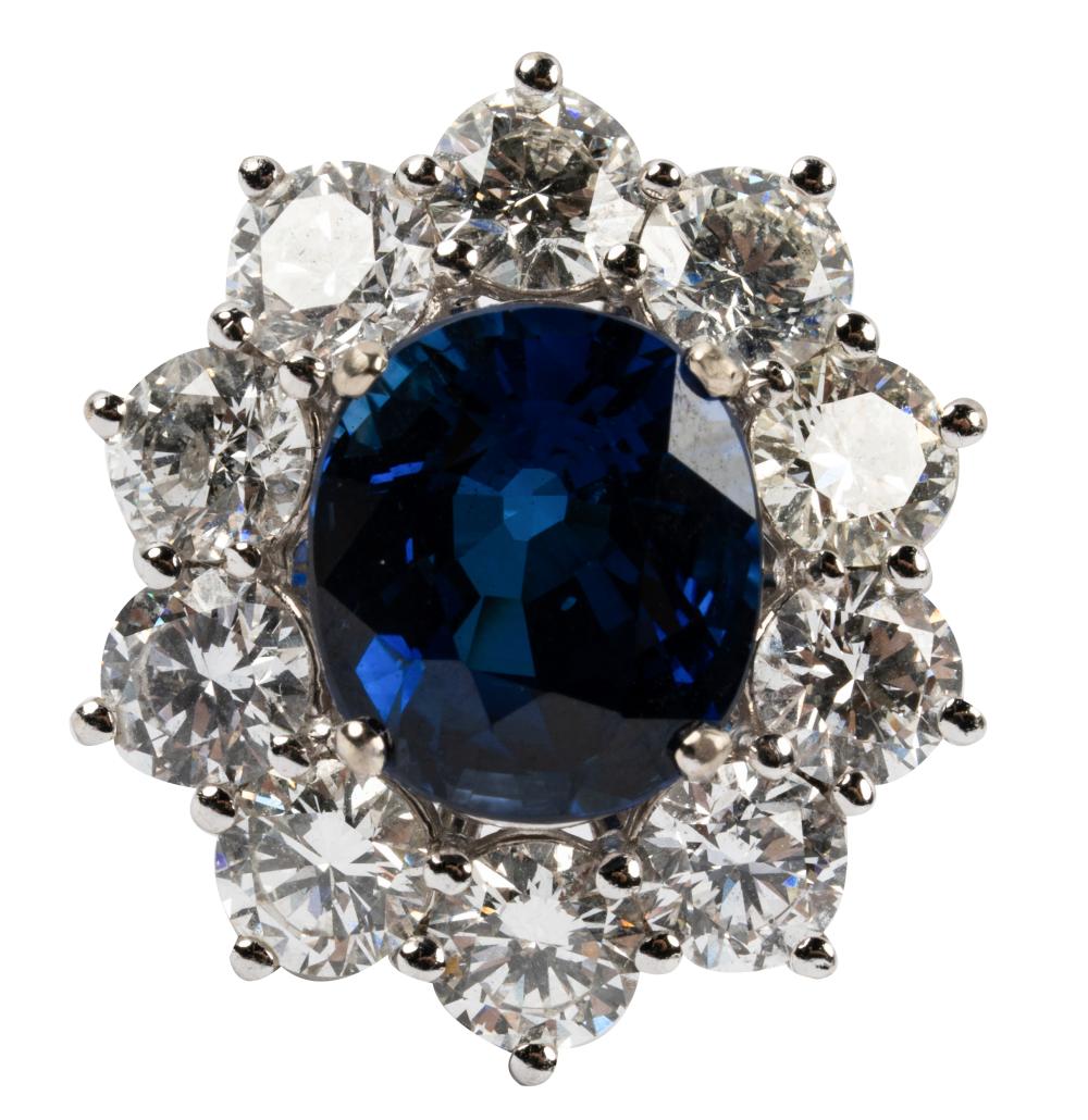 Appraisal: KARAT WHITE GOLD DIAMOND SAPPHIRE RINGcentering one oval mixed cut