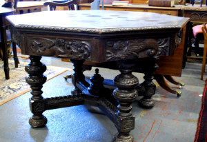 Appraisal: Victorian Gothic revival carved oak library table of octagonal form