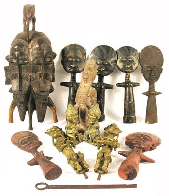 Appraisal: A collection of tribal items including a carved wood double