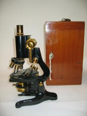 Appraisal: A W WATSON SERVICE MICROSCOPE in brass and black lacquered