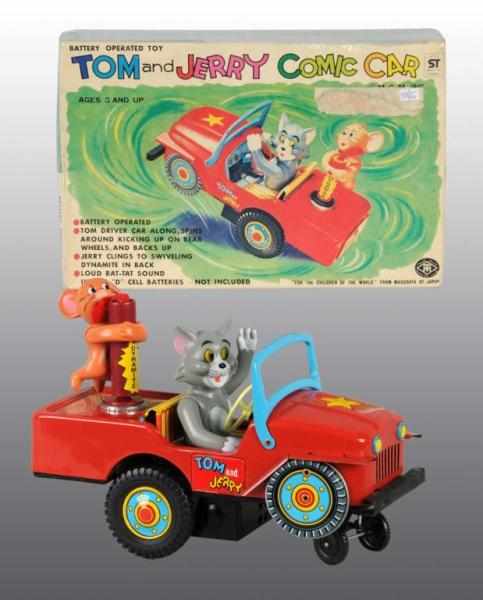 Appraisal: Tin Tom Jerry Comic Car Toy Description Japanese Working Made