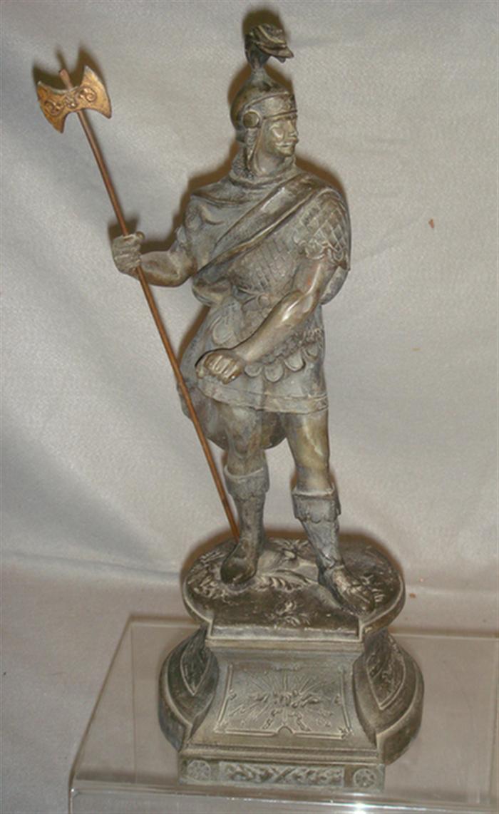 Appraisal: white metal sculptures knight with long pole missing something from