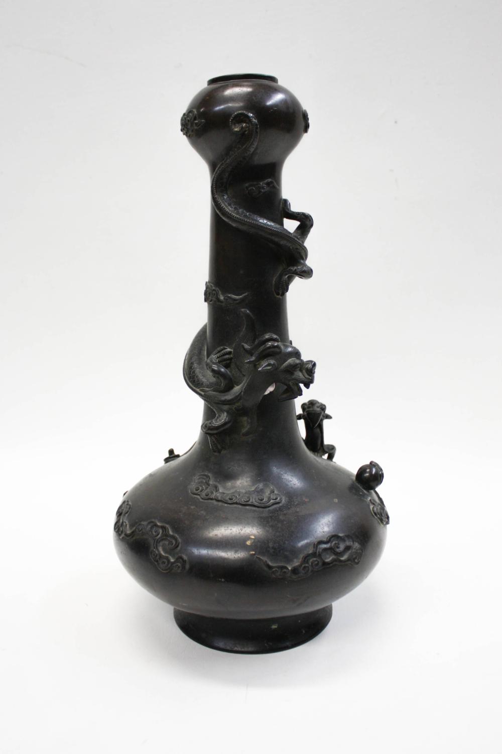 Appraisal: JAPANESE BRONZE DRAGON VASE of garlic head form with elongated