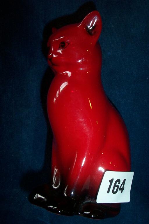 Appraisal: A Royal Doulton flambe model of a seated cat -