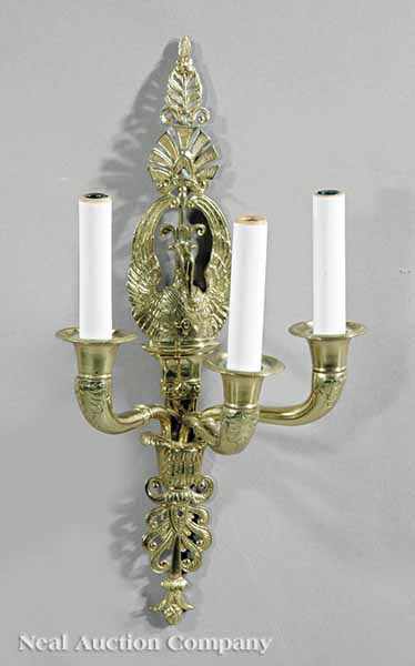 Appraisal: A Pair of Classical-Style Gilt Brass Three-Light Wall Sconces th