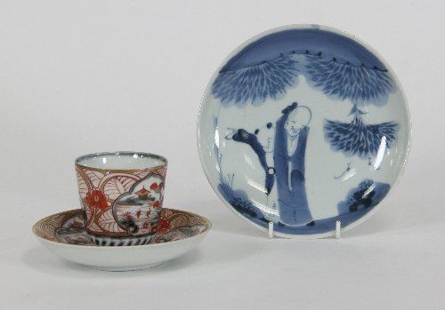 Appraisal: A Japanese imari cup and saucer circa and a Japanese