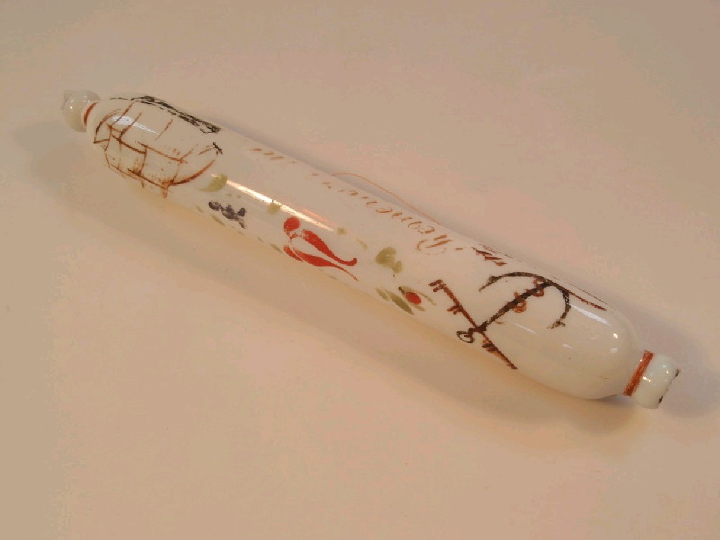 Appraisal: A Victorian opaque white glass rolling pin with painted decoration