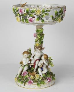 Appraisal: Large Dresden porcelain figural centerpiece having a pierced bowl accented