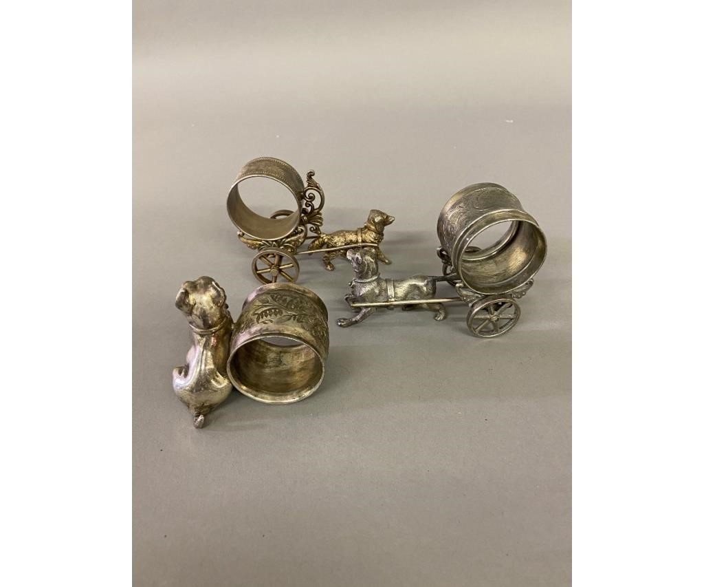 Appraisal: Three Victorian silver plate napkin rings all dogs one with