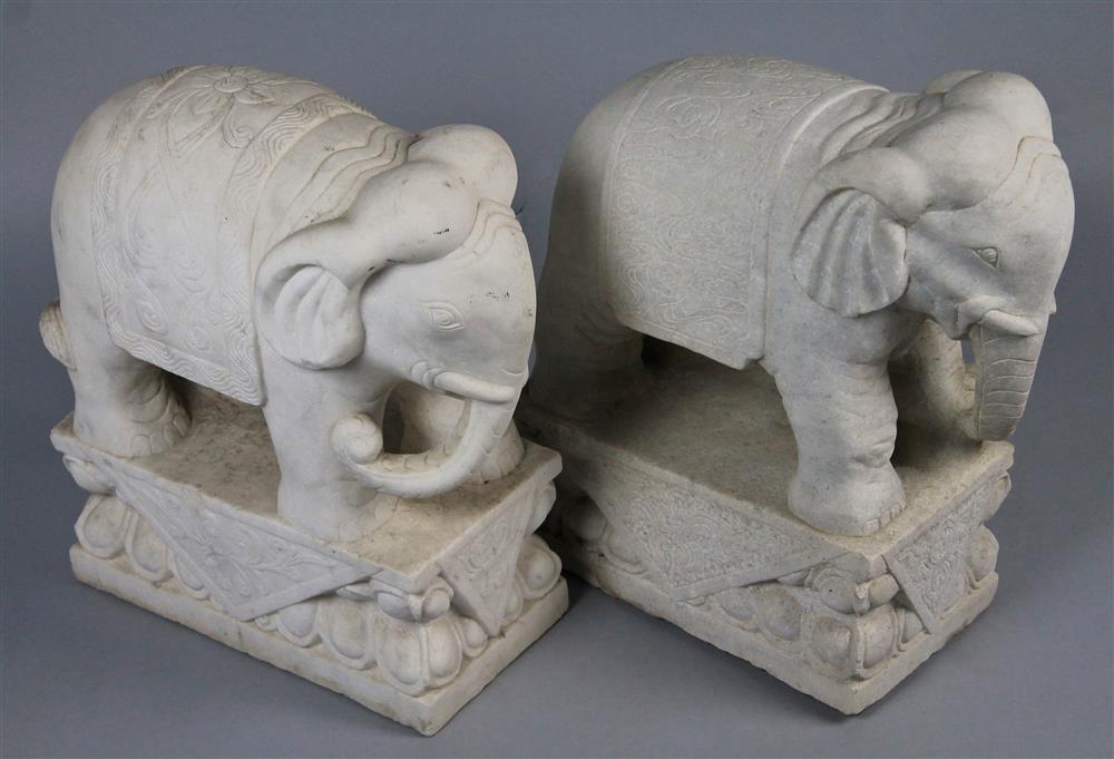 Appraisal: PAIR OF INDIAN CARVED MARBLE ELEPHANTS - h w d