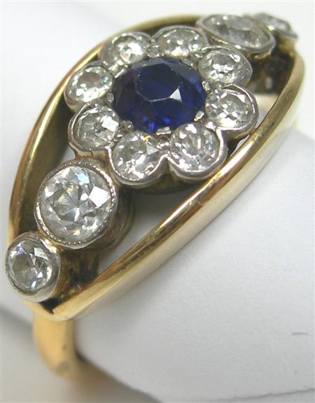 Appraisal: A ct gold mounted sapphire and diamond set cluster ring