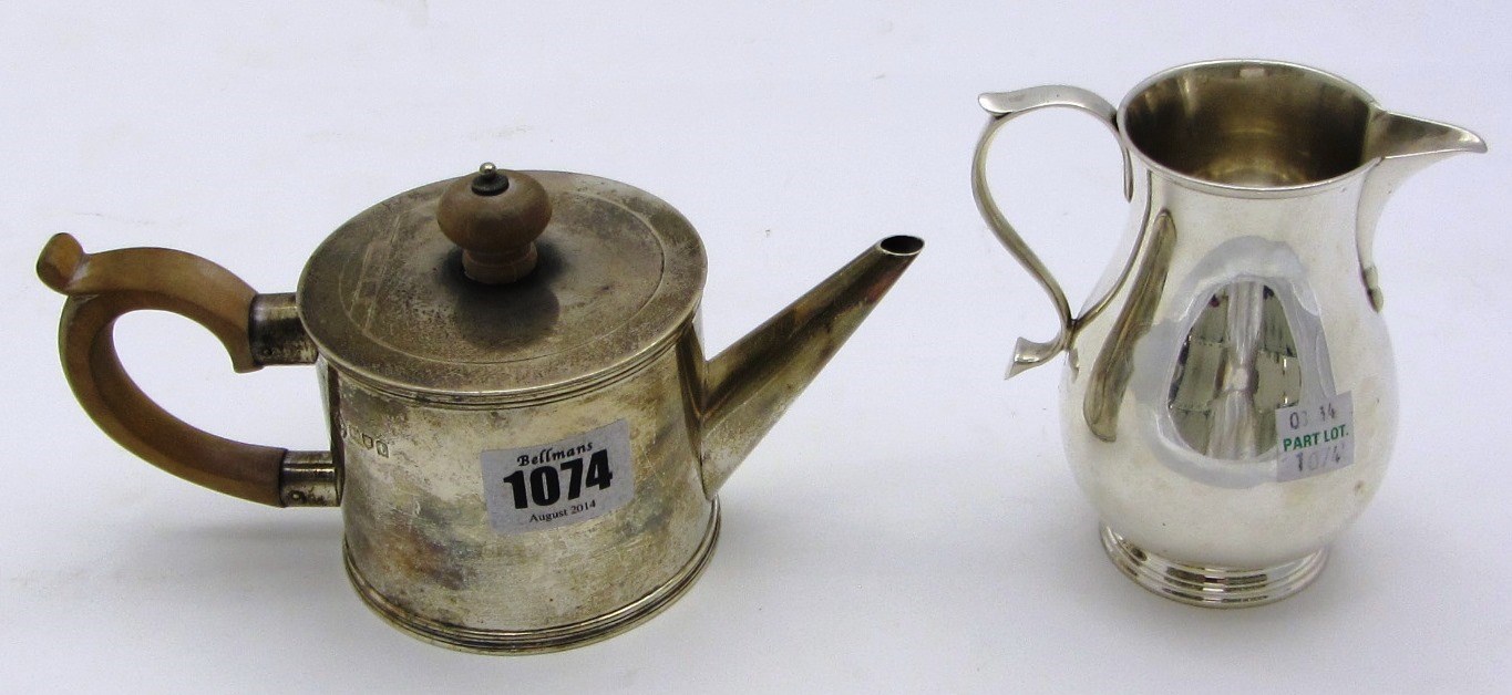 Appraisal: Silver comprising a teapot of plain cylindrical form with a