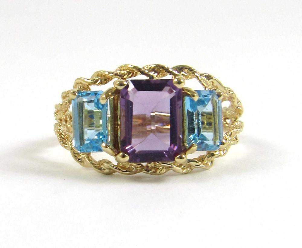 Appraisal: AMETHYST AND BLUE TOPAZ RING Rectangular step-cut purple amethyst ct