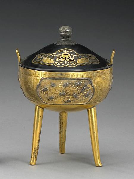 Appraisal: A gilt copper tripod censer Qing Dynasty th th Century