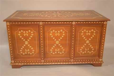 Appraisal: BONE-INLAID MAHOGANY BLANKET CHEST the rectangular hinged top over a