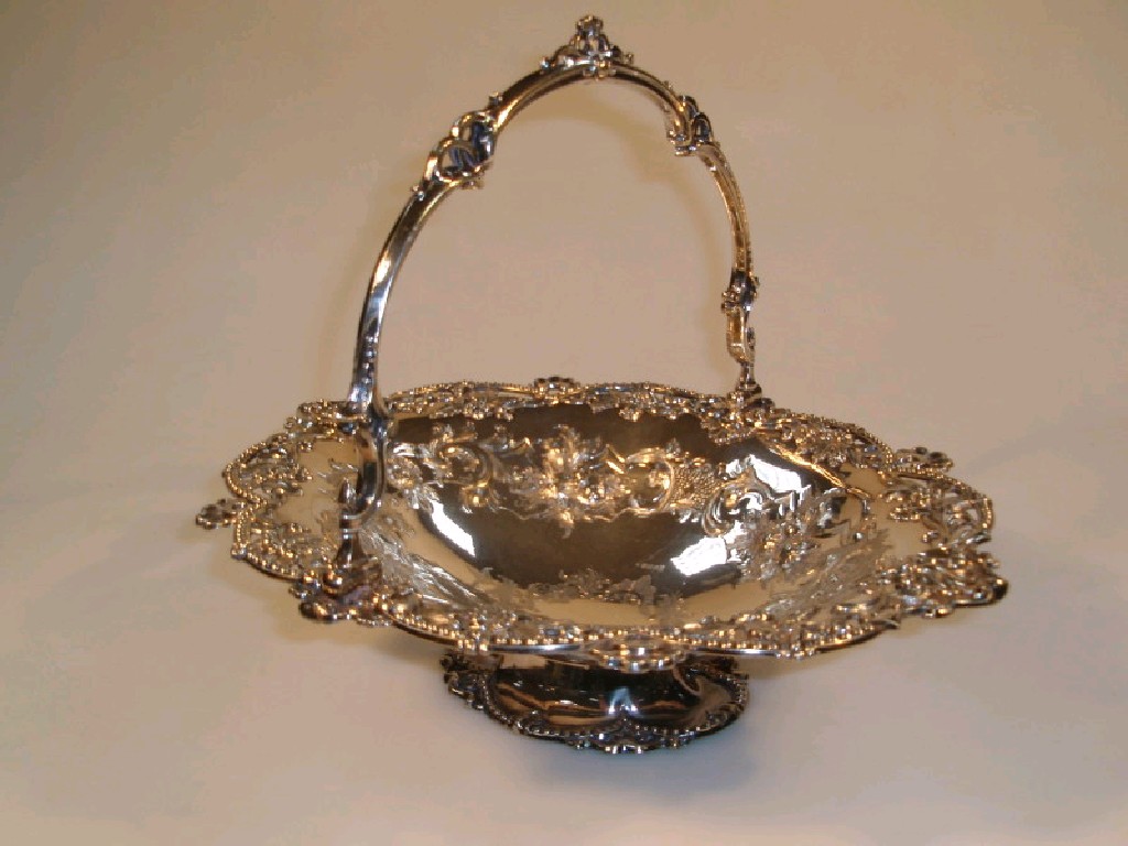 Appraisal: A late Victorian oval silver plated basket with swing handle