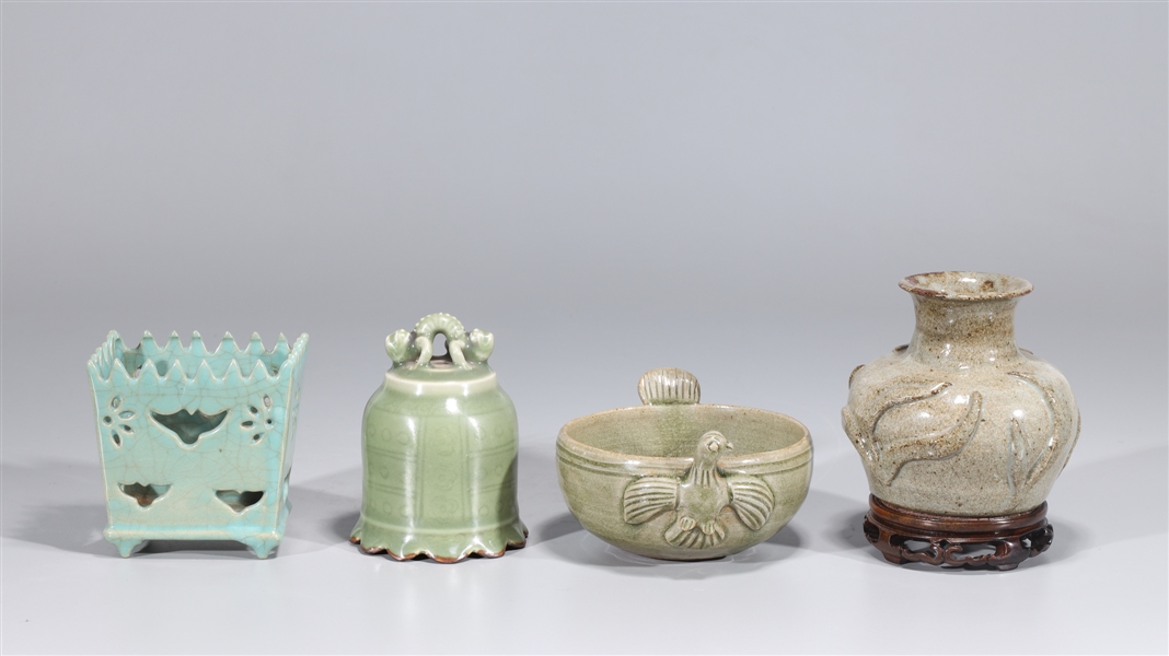 Appraisal: Group of four Chinese celadon ceramics including vase with molded