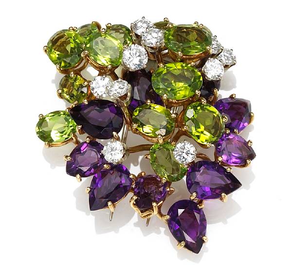 Appraisal: A diamond amethyst and peridot brooch estimated total diamond weight