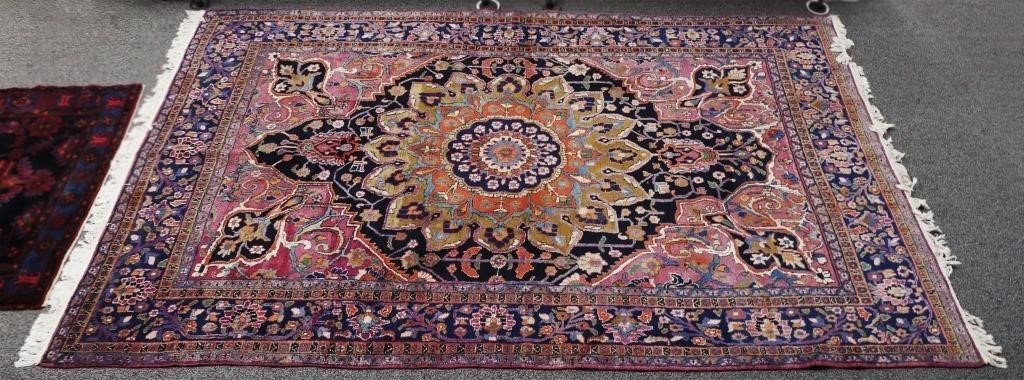 Appraisal: Vintage hand tied Heriz rug Rug has large center medallion