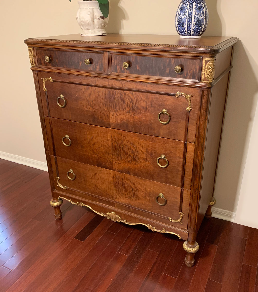 Appraisal: DRAWER CHEST GOLD GILT ACCENTS drawers over drawer chest gold