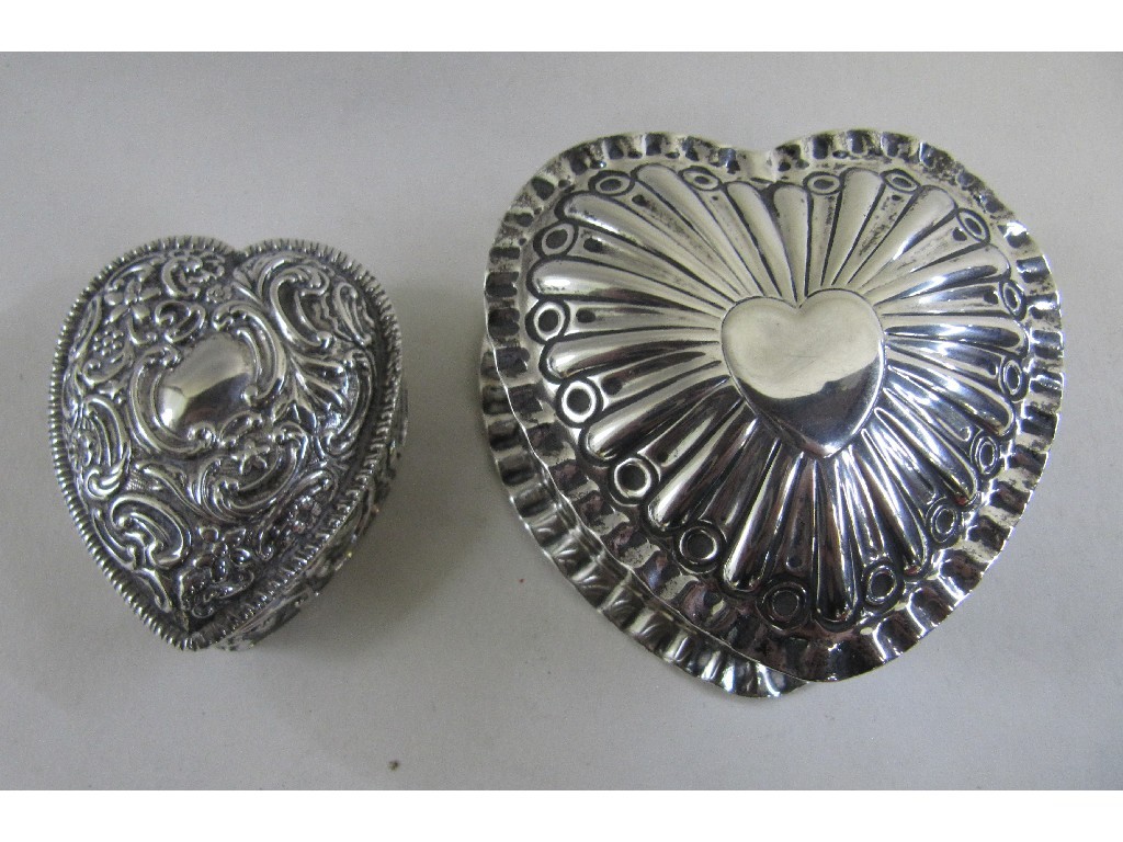 Appraisal: Lot comprising two silver heart shaped trinket boxes London and