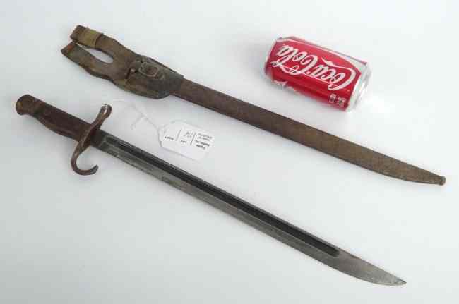 Appraisal: Japanese bayonet in original case Marked with circles near handle