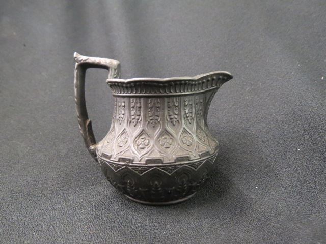 Appraisal: Wedgwood Basalt Creamer raised leaf and arch designs excellent