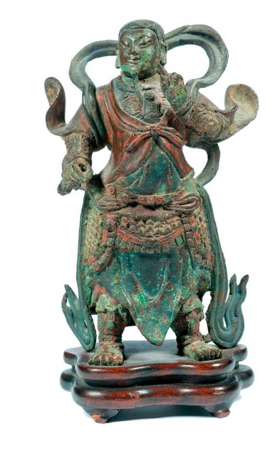 Appraisal: A SMALL BRONZE FIGURE OF WEITUO China Ming dynasty height