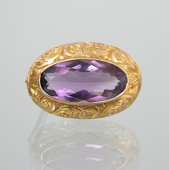 Appraisal: A Delicate Amethyst and Gold Brooch k yellow gold frame