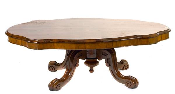 Appraisal: A Regency rosewood tilt-top tea table reduced in height restored