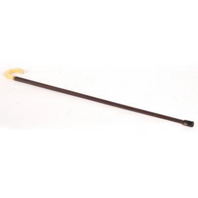 Appraisal: A Victorian rosewood walking cane with ivory handle and a