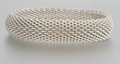 Appraisal: A Tiffany Co Somerset Bracelet Sterling silver flexible mesh bangle