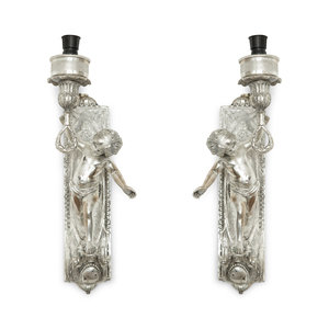 Appraisal: A Pair of Continental Silvered Metal Figural Wall Lights Late