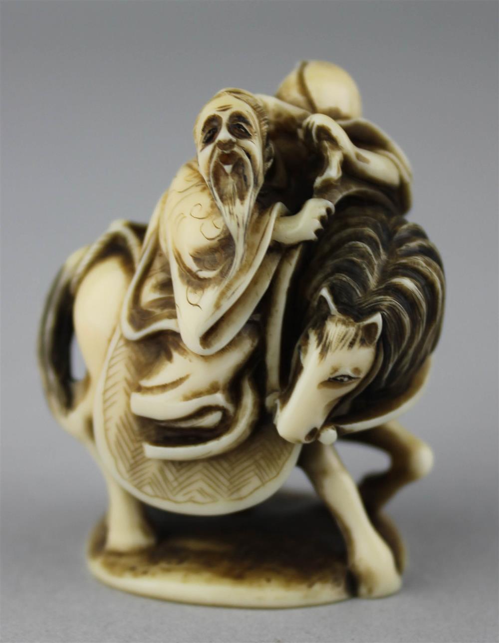 Appraisal: JAPANESE IVORY DAIKOKU ON HORSEBACK HOLDING A BRANCH OF FRUITING