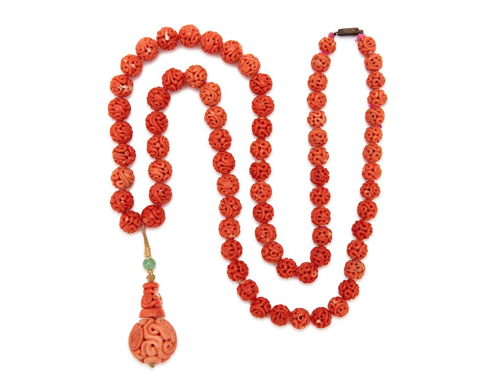 Appraisal: Carved Coral Bead Necklace Carved Coral Bead Necklace comprising graduated