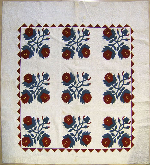 Appraisal: Appliqu quilt th c with a floral sprays within a