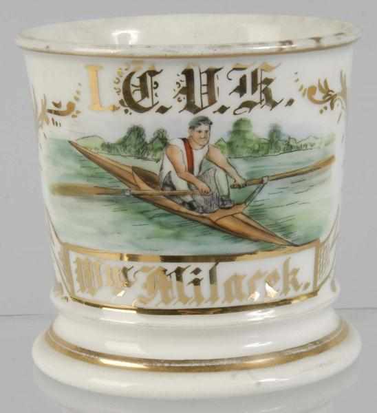 Appraisal: Man in Kayak Shaving Mug Description Marked I C U