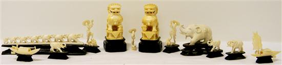 Appraisal: Pair of carved ivory foo dogs on wooden bases ''