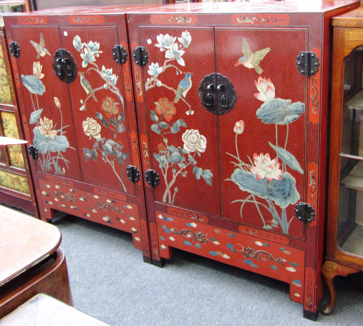 Appraisal: A pair of th century Chinese red lacquer and polychrome