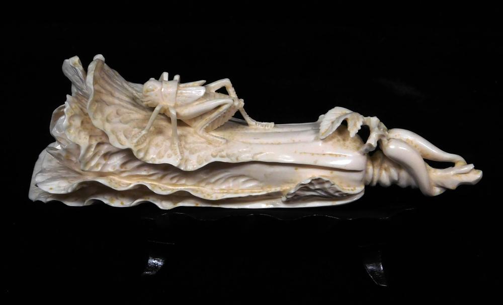 Appraisal: ASIAN Ivory carving of insect on bok choy plant Chinese