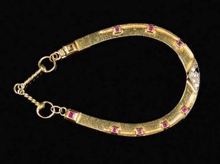 Appraisal: George Headley Horseshoe Bracelet George Headley K yellow gold ruby